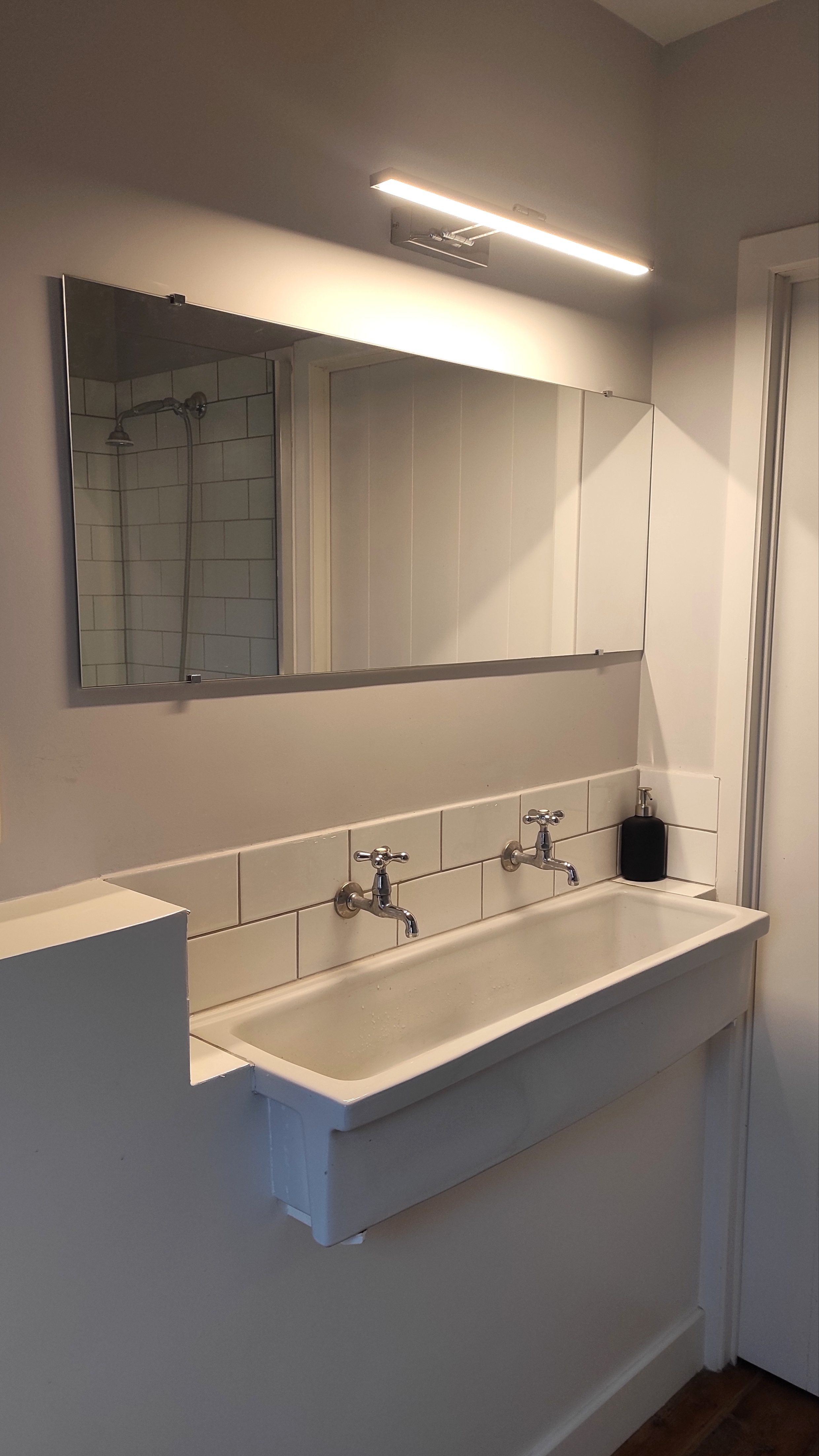 Another shared shower bathroom at La Maison Vienvenue, clean, nice, and authentic.