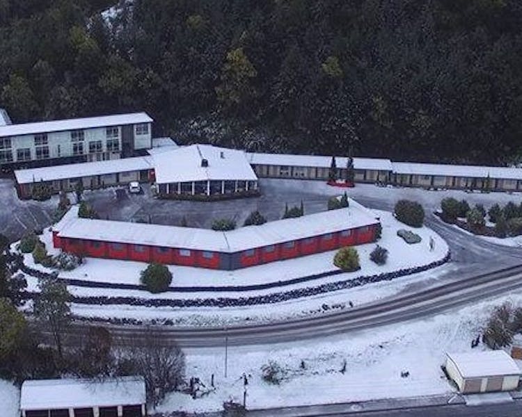 Arial shot of Silver Hills Motel in snow