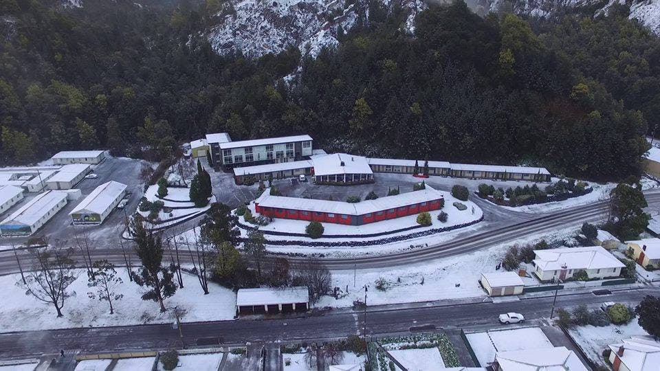 Arial shot of Silver Hills Motel in snow