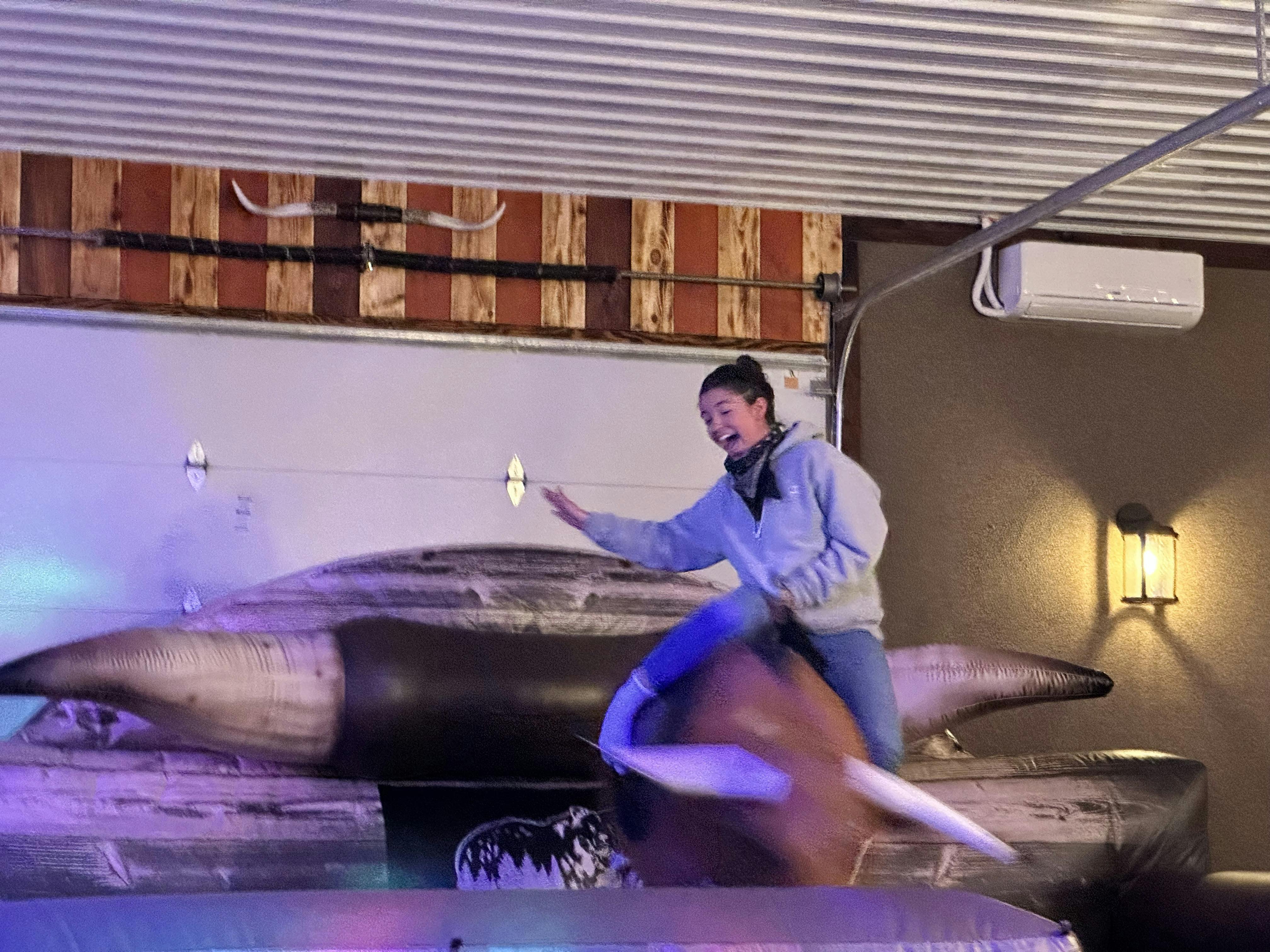 Mechanical Bull Riding in the Rhinestone Event Center at Best Bear Lodge & Campground