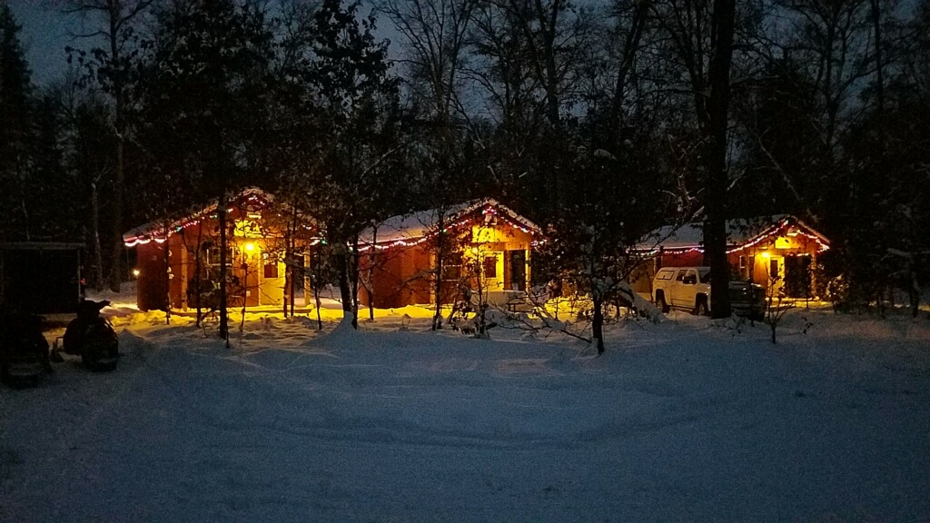 Snowy winter scene of the Yonder Cabins at Best Bear Resort Irons Michigan