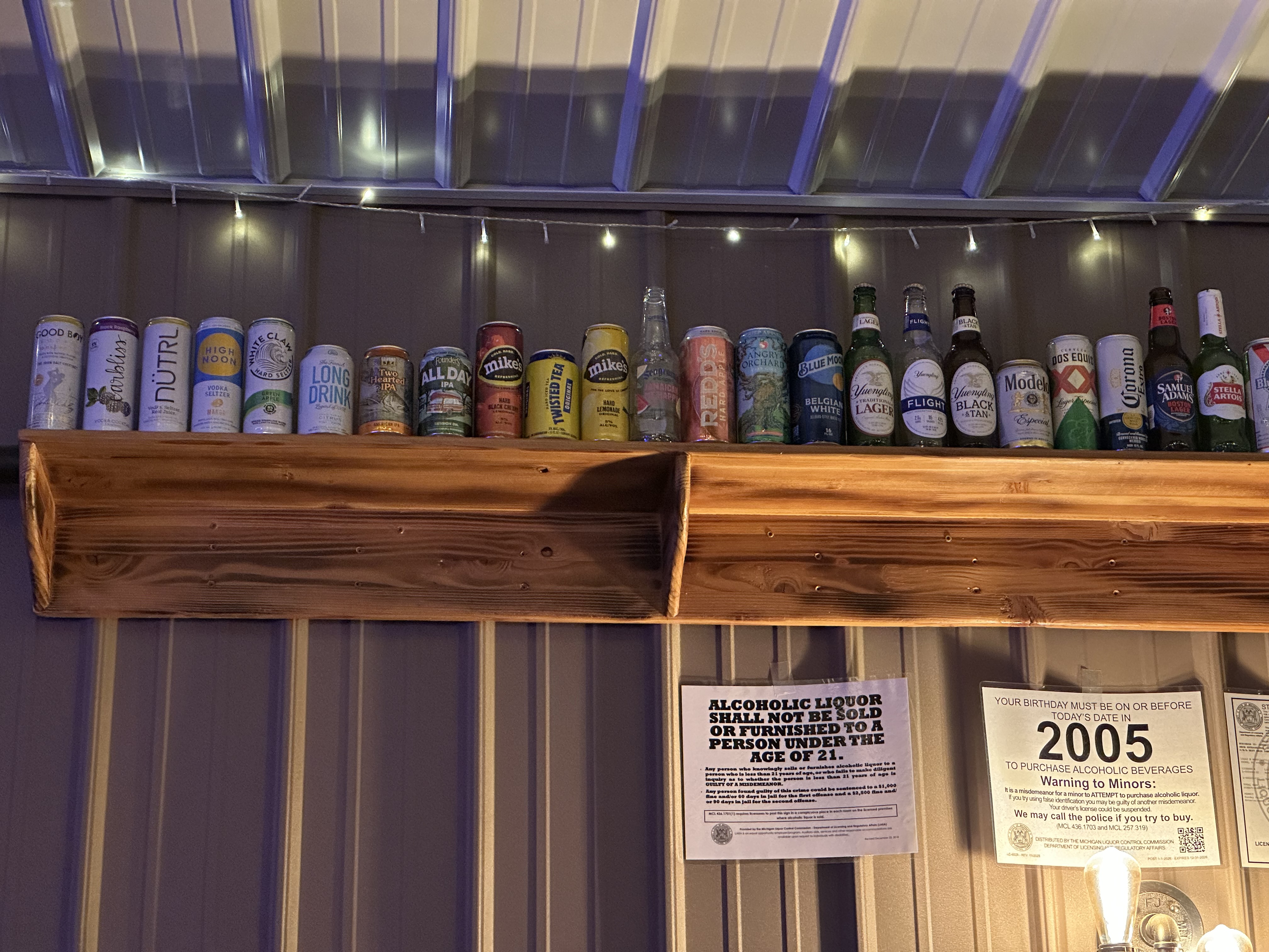 Full selection of available beer and seltzers on display.