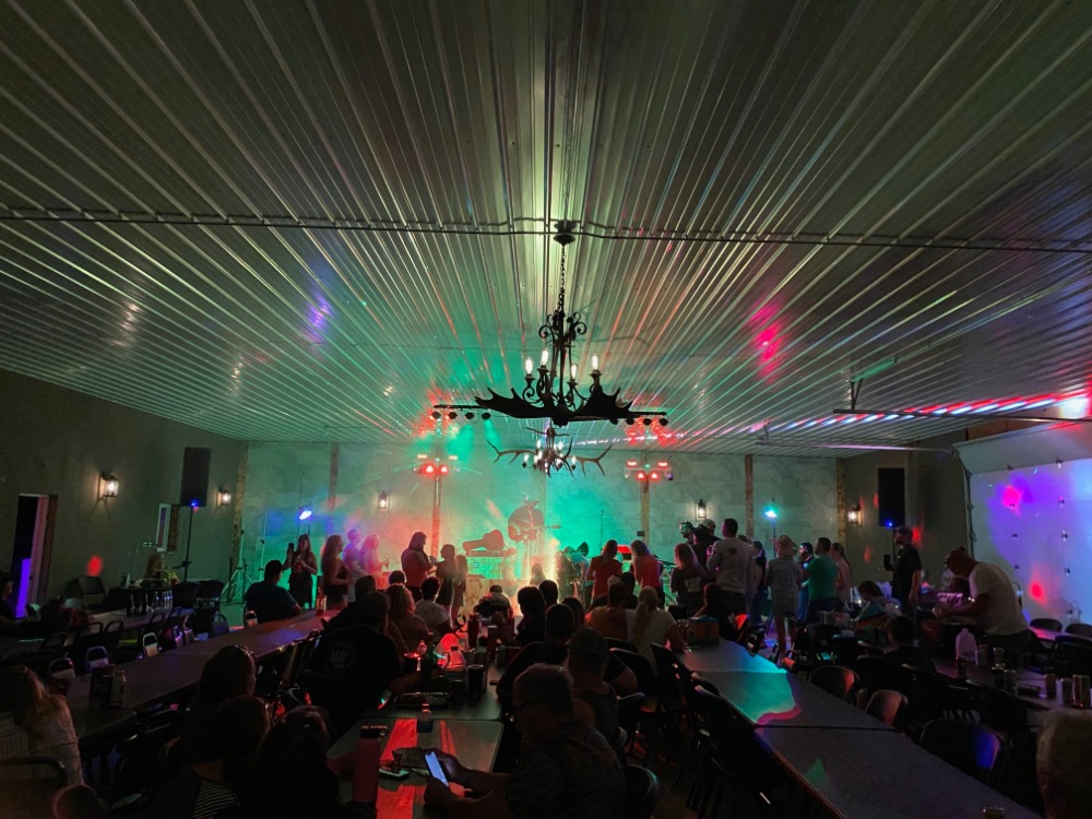 alt="Waylon Hanel performing live in the Rhinestone Event Center at Best Bear Lodge & Campground in Irons Michigan"