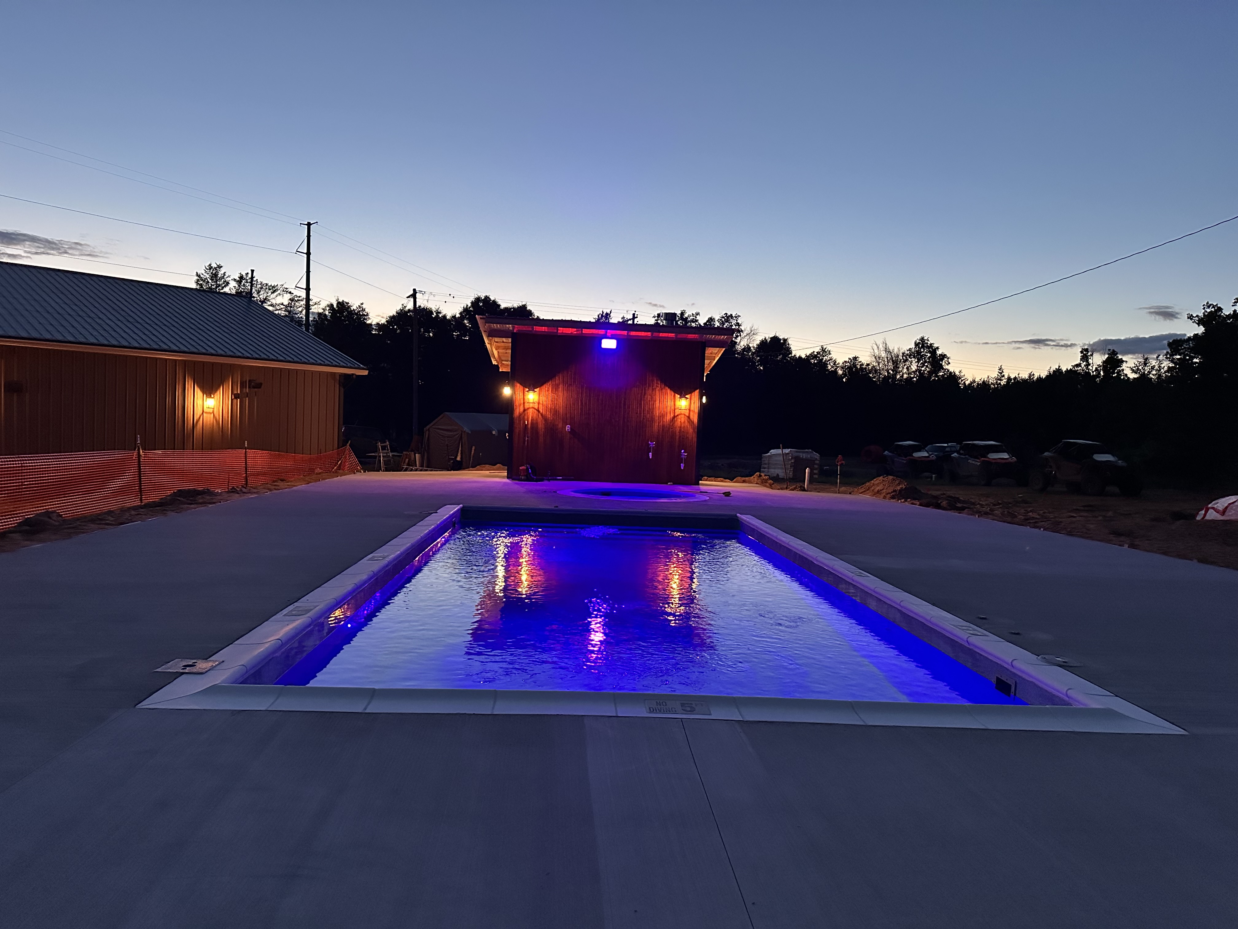alt="Pool and hot tub at Best Bear Lodge & Campground in Irons Michigan" 1