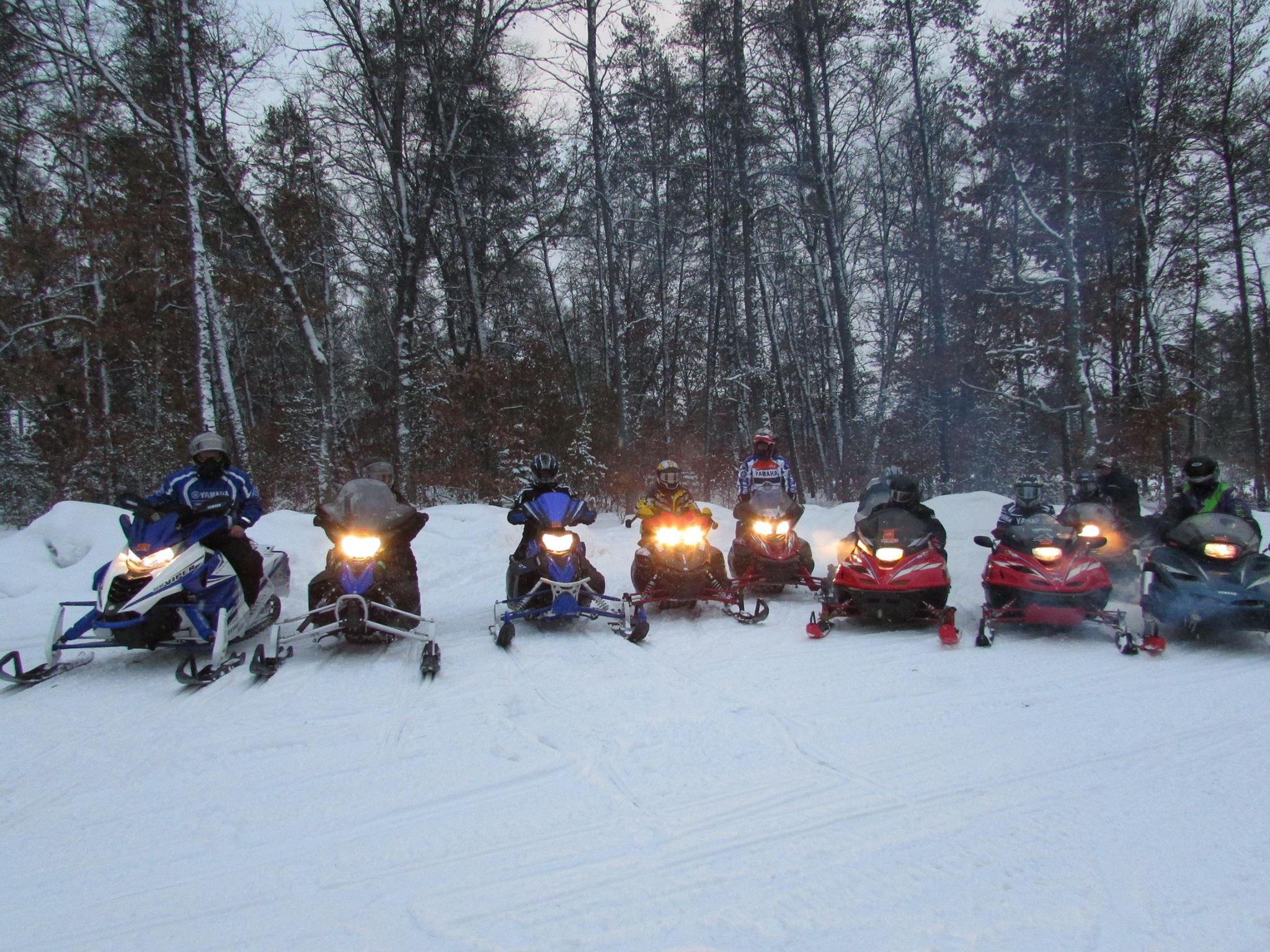 alt="Direct access to over 800 miles of snowmobile trails from Best Bear Lodge & Campground in Irons Michigan"
