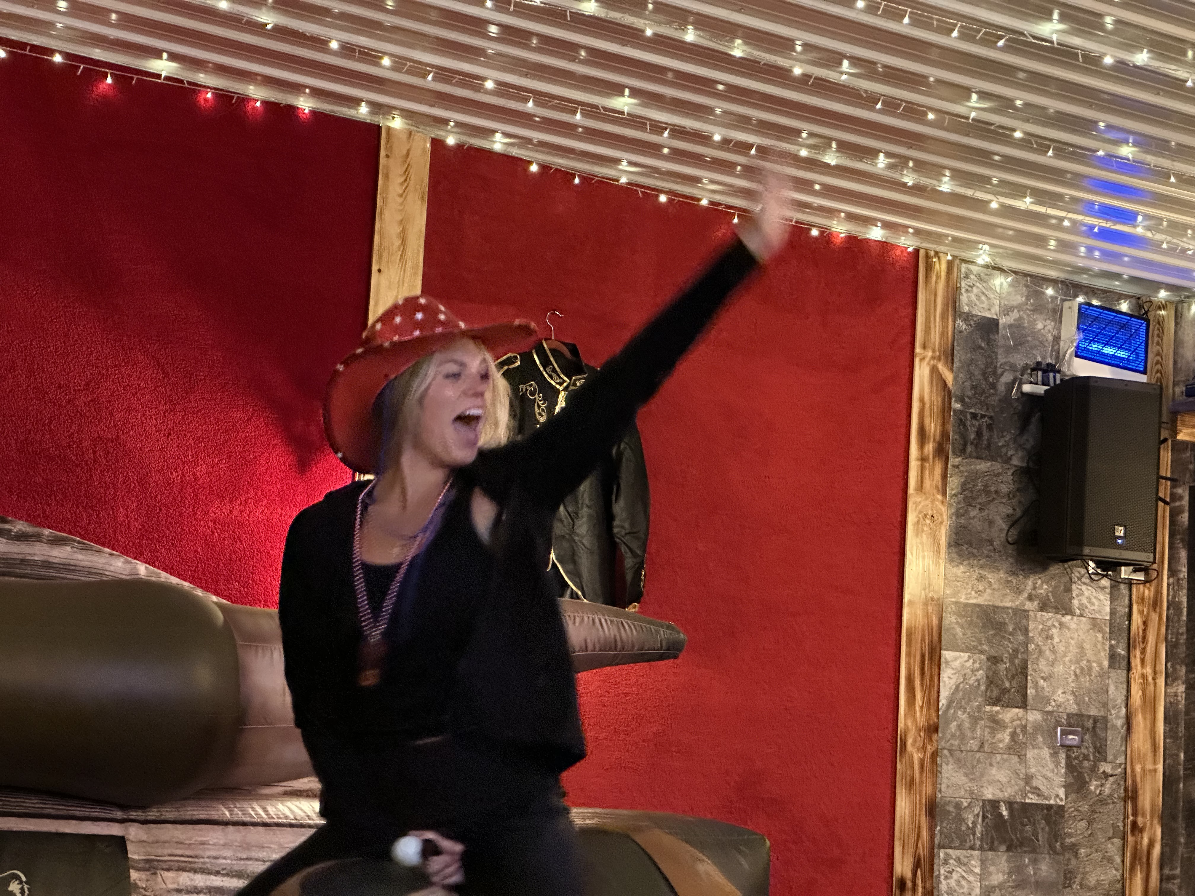 alt="Mechanical bull riding at Rhinestone Event Center, Best Bear Lodge & Campground in Irons Michigan"