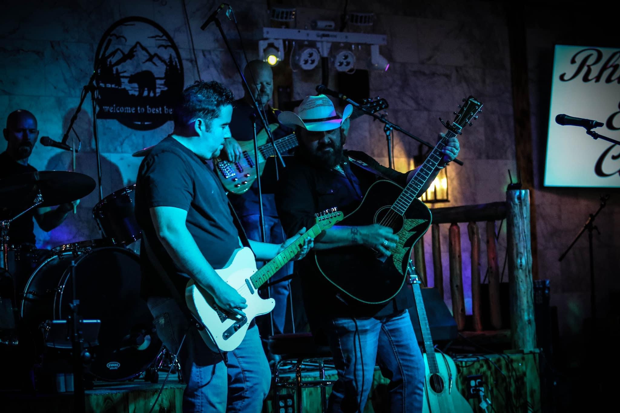 alt="Ray Scott and The Trophy Husbands Band live performance at Rhinestone Event Center Best Bear Lodge in Irons Michigan"