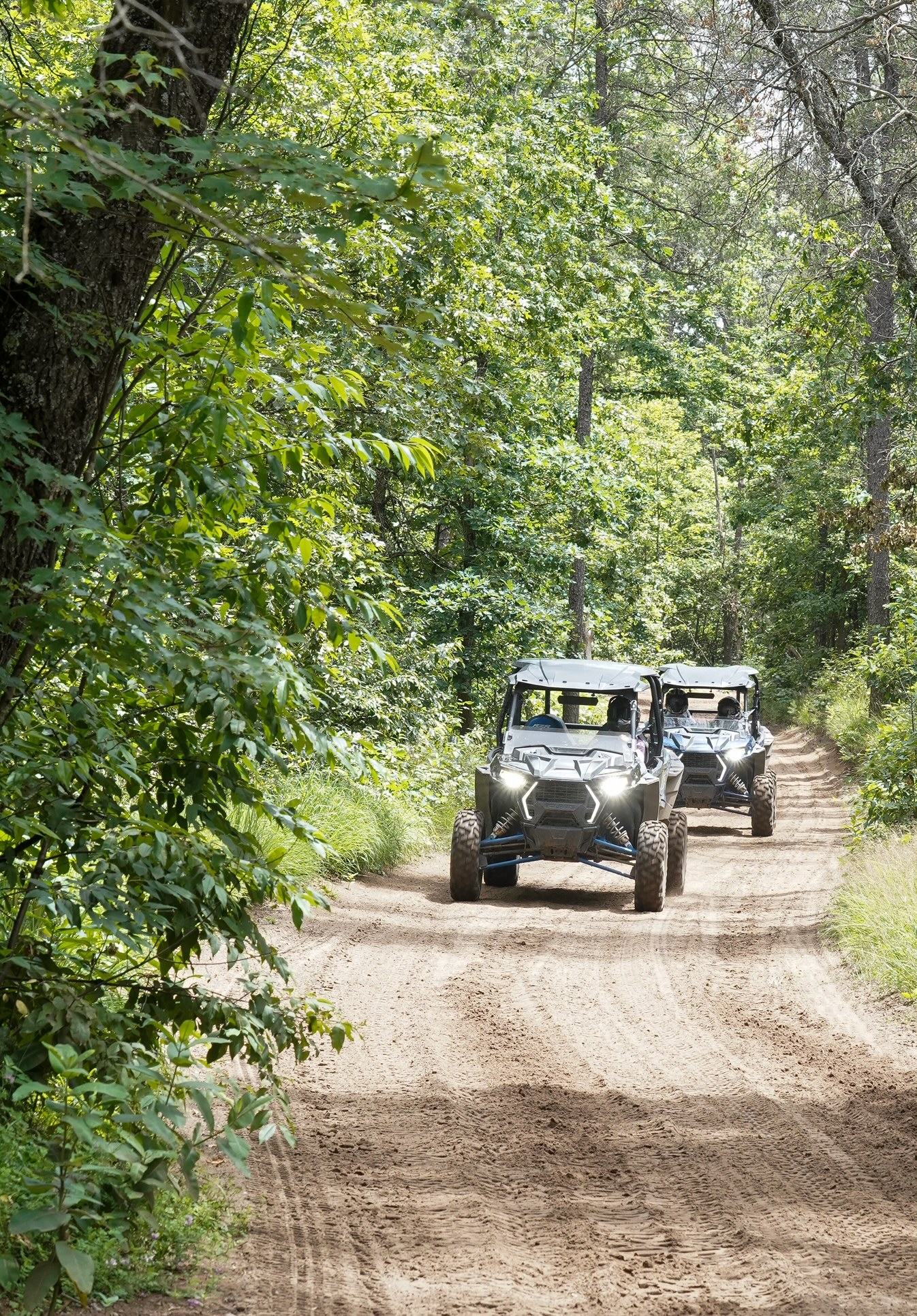 alt="Customers enjoying Polaris UTV rentals — ride Michigan’s trails, adventure starts here at Best Bear Lodge in Irons MI"