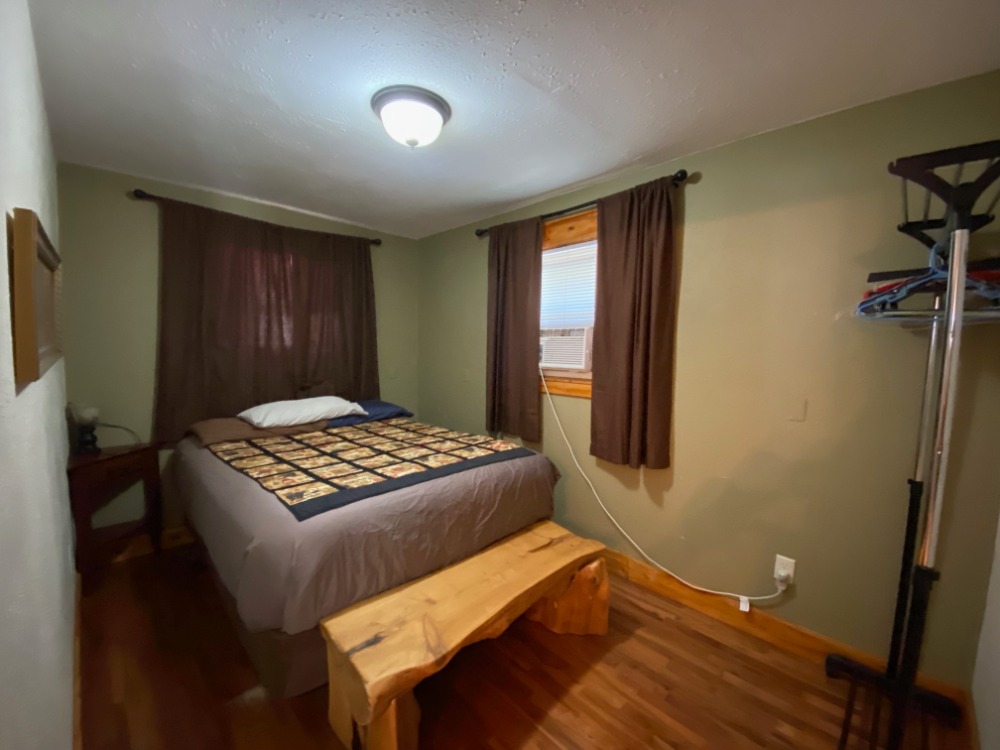 Lincoln Hills Cabin Master Bedroom at Best Bear Lodge & Campground. Irons, Michigan