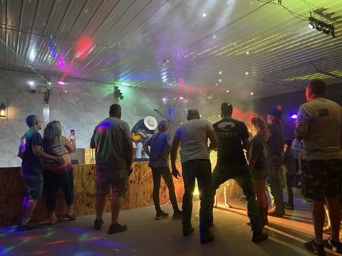 alt="Waylon Hanel performing live in the Rhinestone Event Center at Best Bear Lodge & Campground in Irons Michigan"