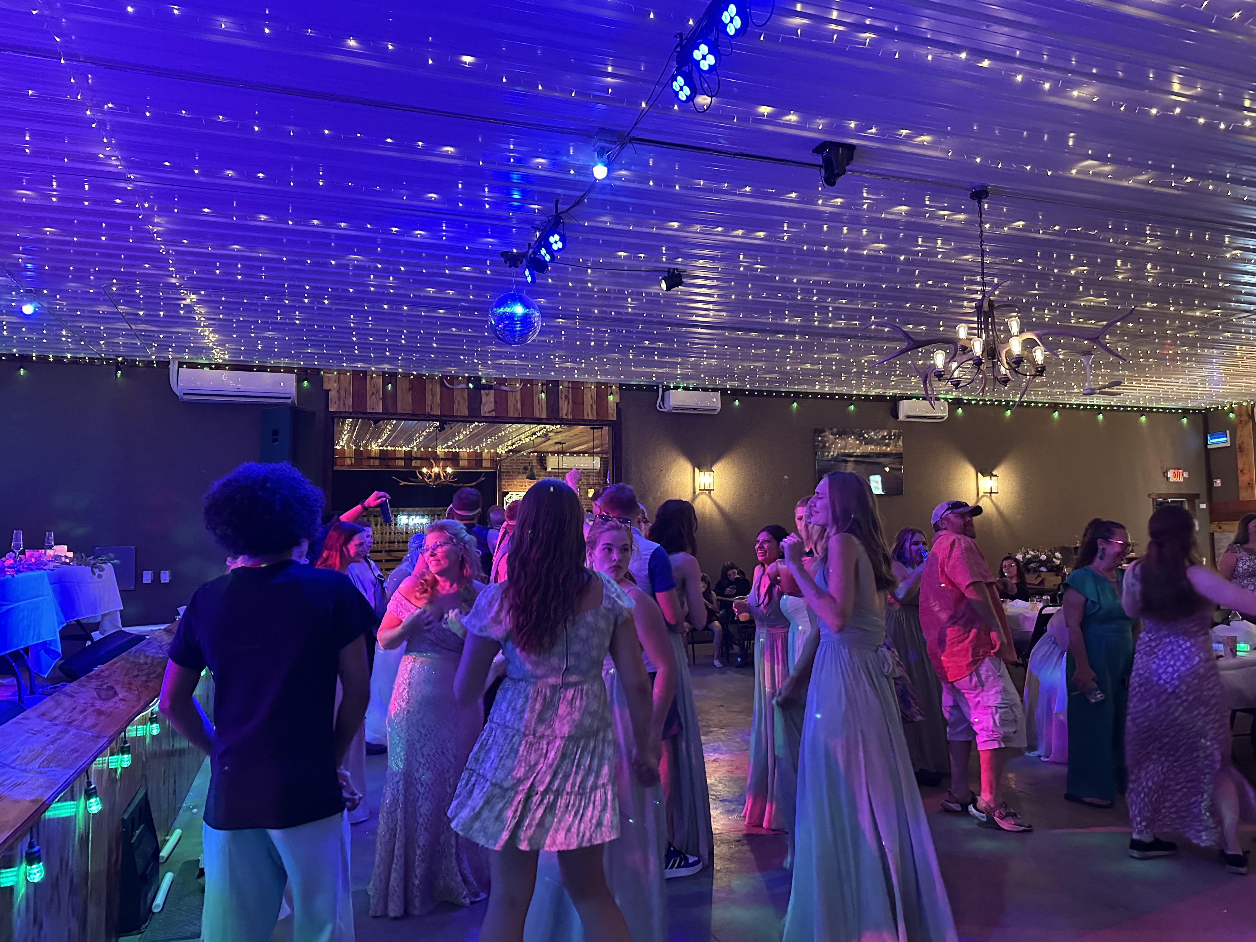 alt="Wedding at Best Bear Lodge Rhinestone Event Center in Irons Michigan