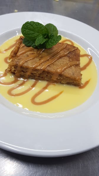 Sticky Date Pudding with warm custard