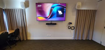 Meeting room video conferencing. Hybrid meetings