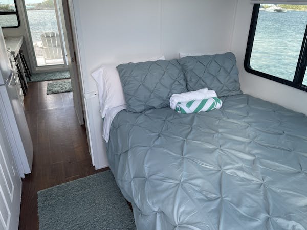 queen bed in houseboat