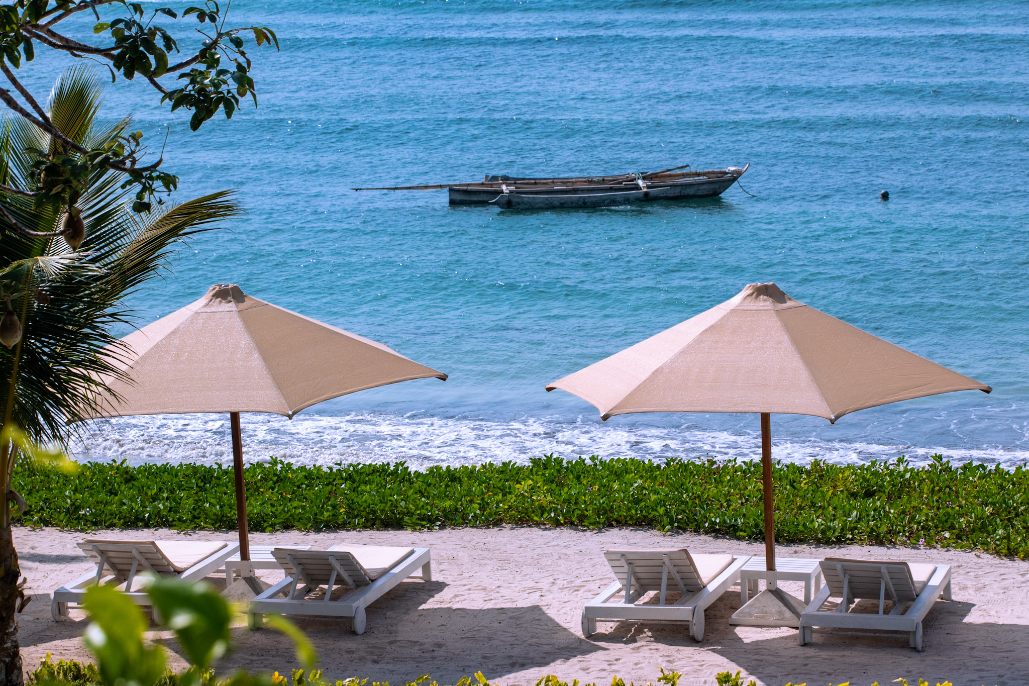 Ocean view and sun beds on the beach at Zahari Oceanfront on the beachfront in Msambweni, Kenya