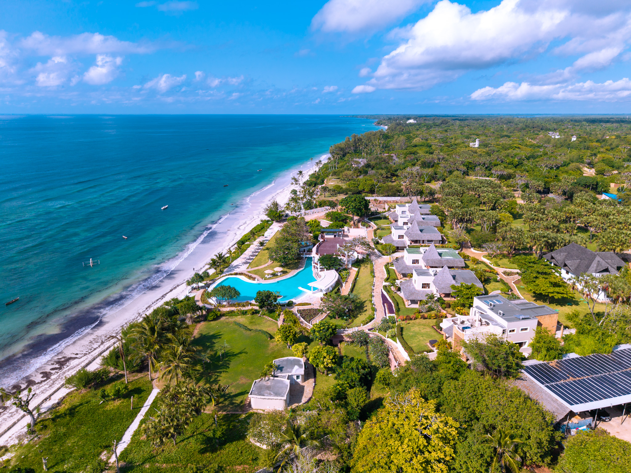 Infinity pool and beachfront at Zahari Oceanfront in Msambweni
