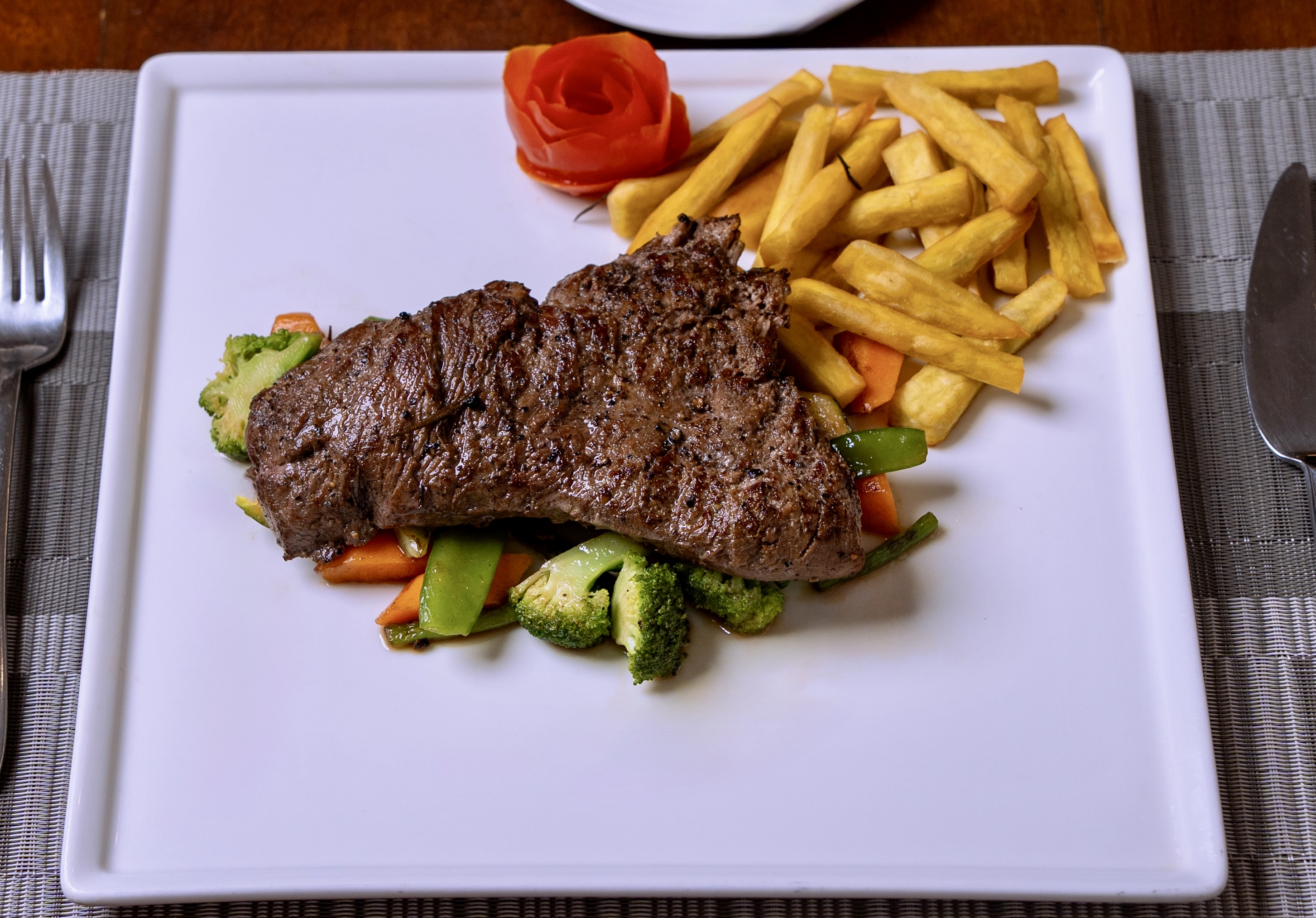 Steak and fries served at Zahari Oceanfront's Oceanview Restaurant