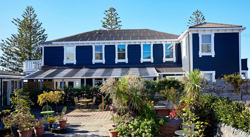 From courtyard garden to the rear of historic hotel building
