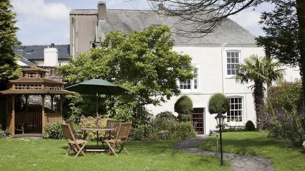 Enjoy the charm of Lonsdale House's Secret Garden, which is private and safe