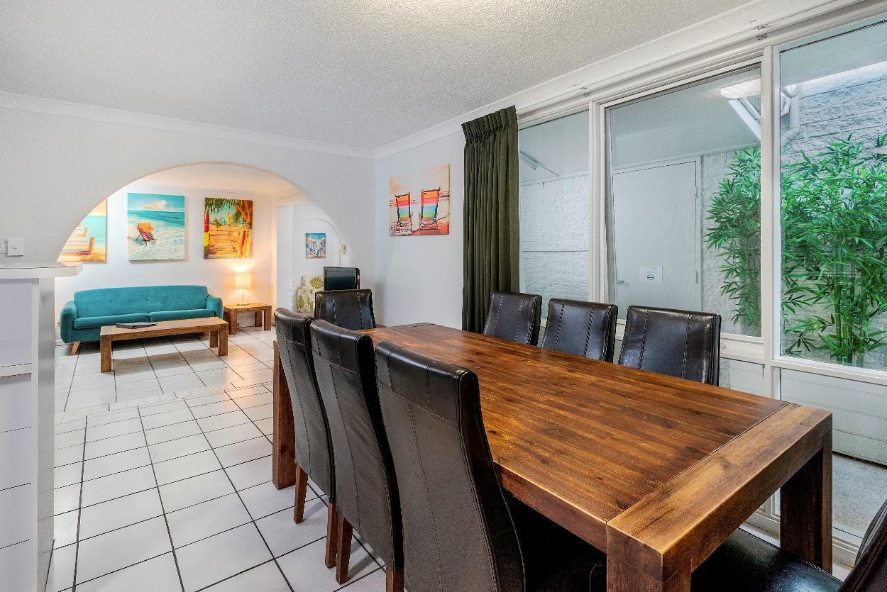 Large dining area in the apartment, suitable for groups or long stays in Hervey Bay