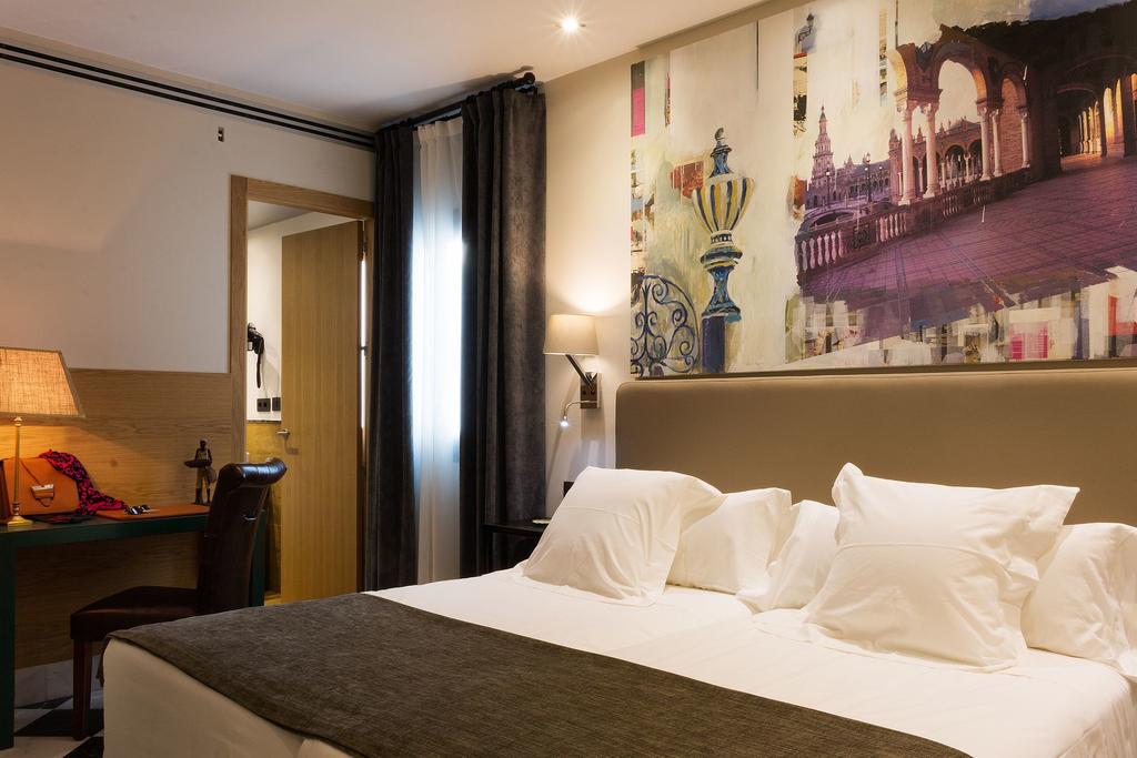 DELUXE one bedroom DUPLEX. Aguilas5 SevillaSuites