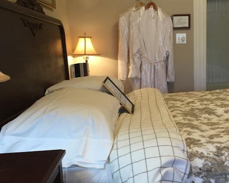 Luxurious Robes and queen bed in Tuolumne Room