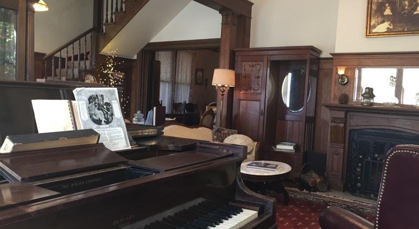 Working player piano in parlor