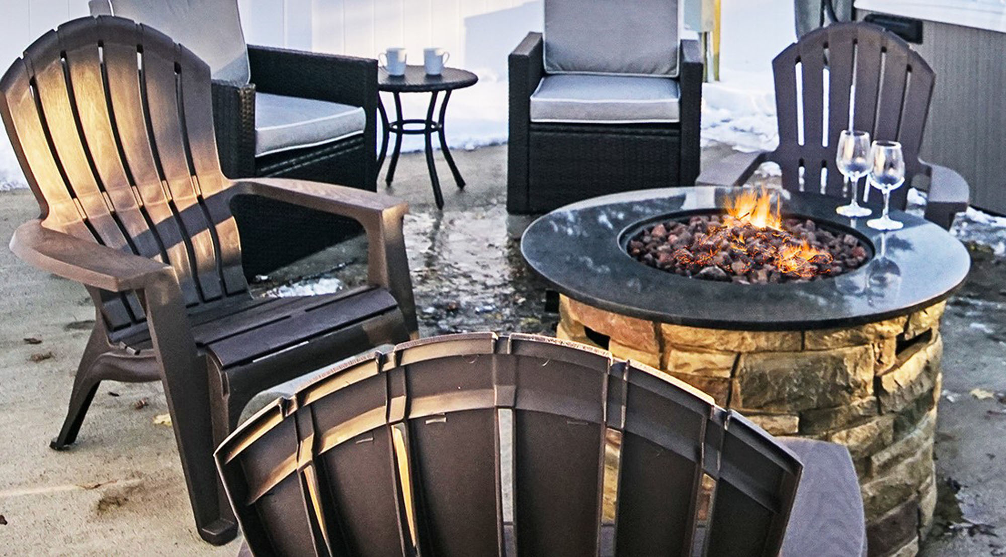 Outdoor fire table Coastal Suites Resort Michigan