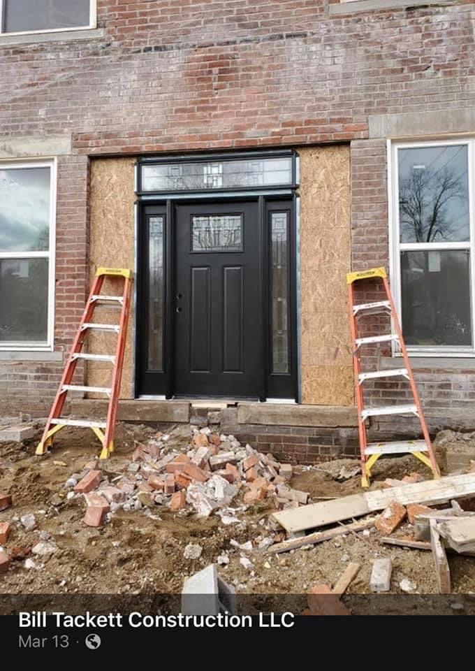 Front door installation before the covered front porch was added!