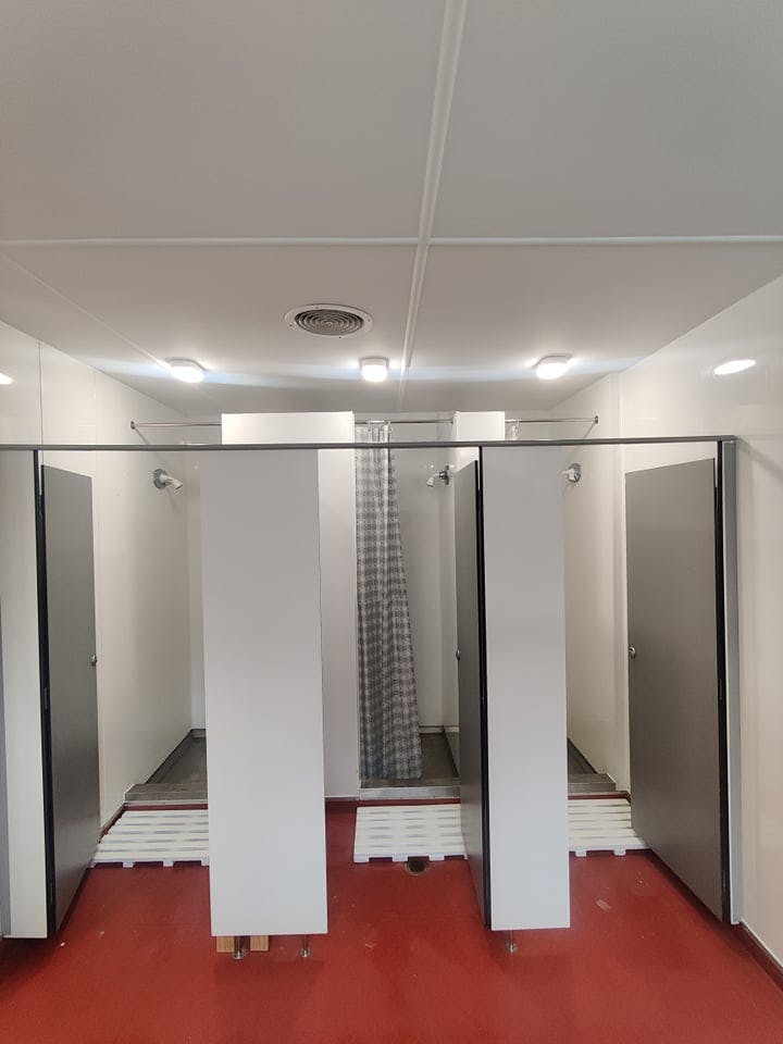 Separate male and female showers at QBox Campground Queenstown