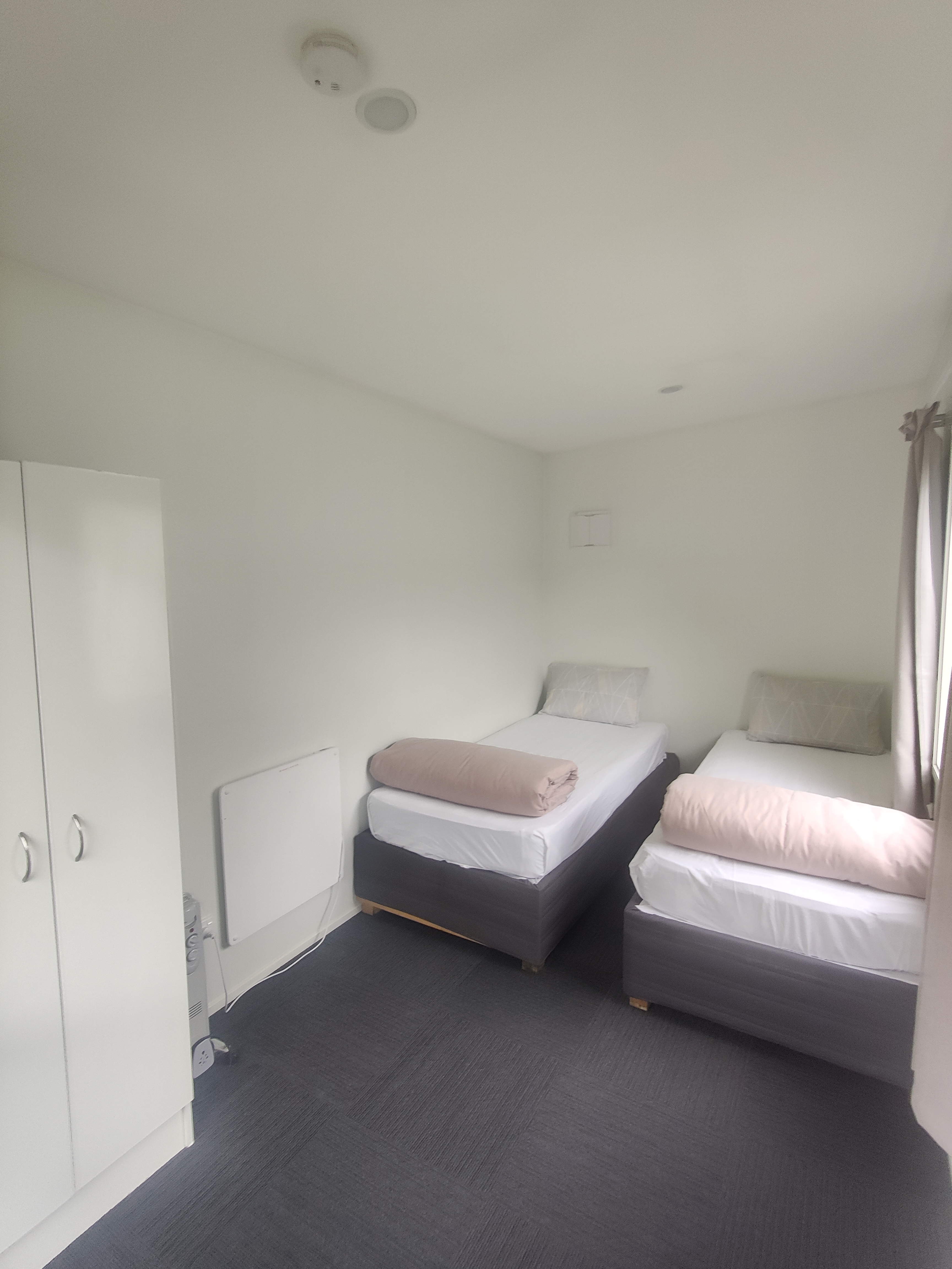 Twin, single or double rooms at QBox Campground Queenstown