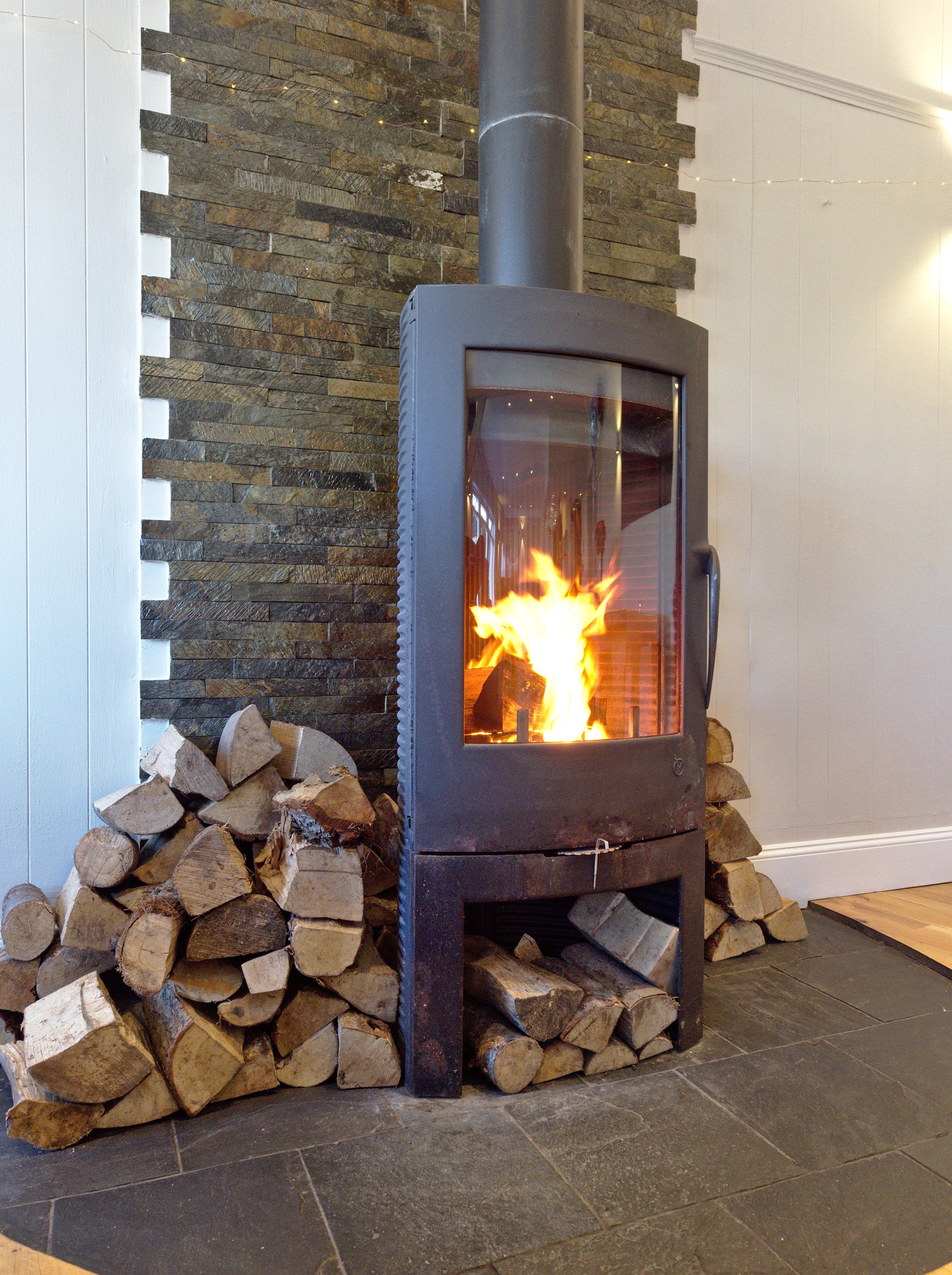 Cosy woodturning stove at Lochindaal Seafood Kitchen