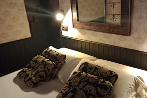 Detalle cama y cabecero Kioto
