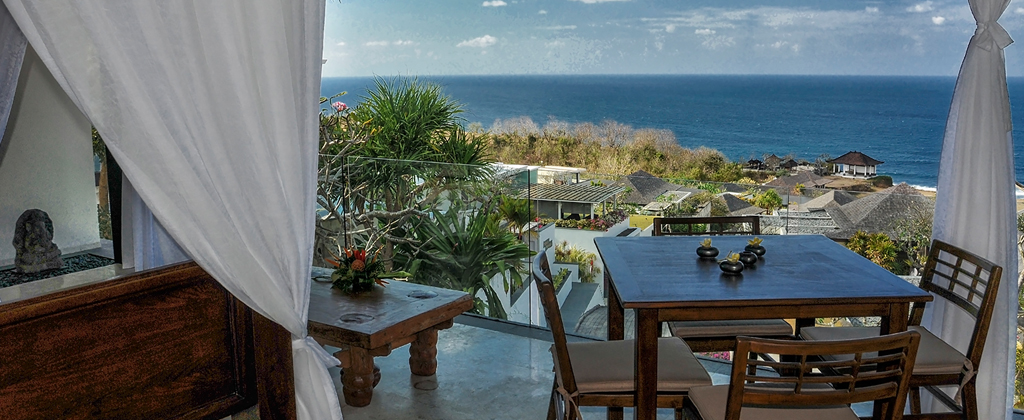 PRIVATE VILLAS OF BALI - Villa Tirta Kencana - ocean vista suite upper level living room with ocean views.