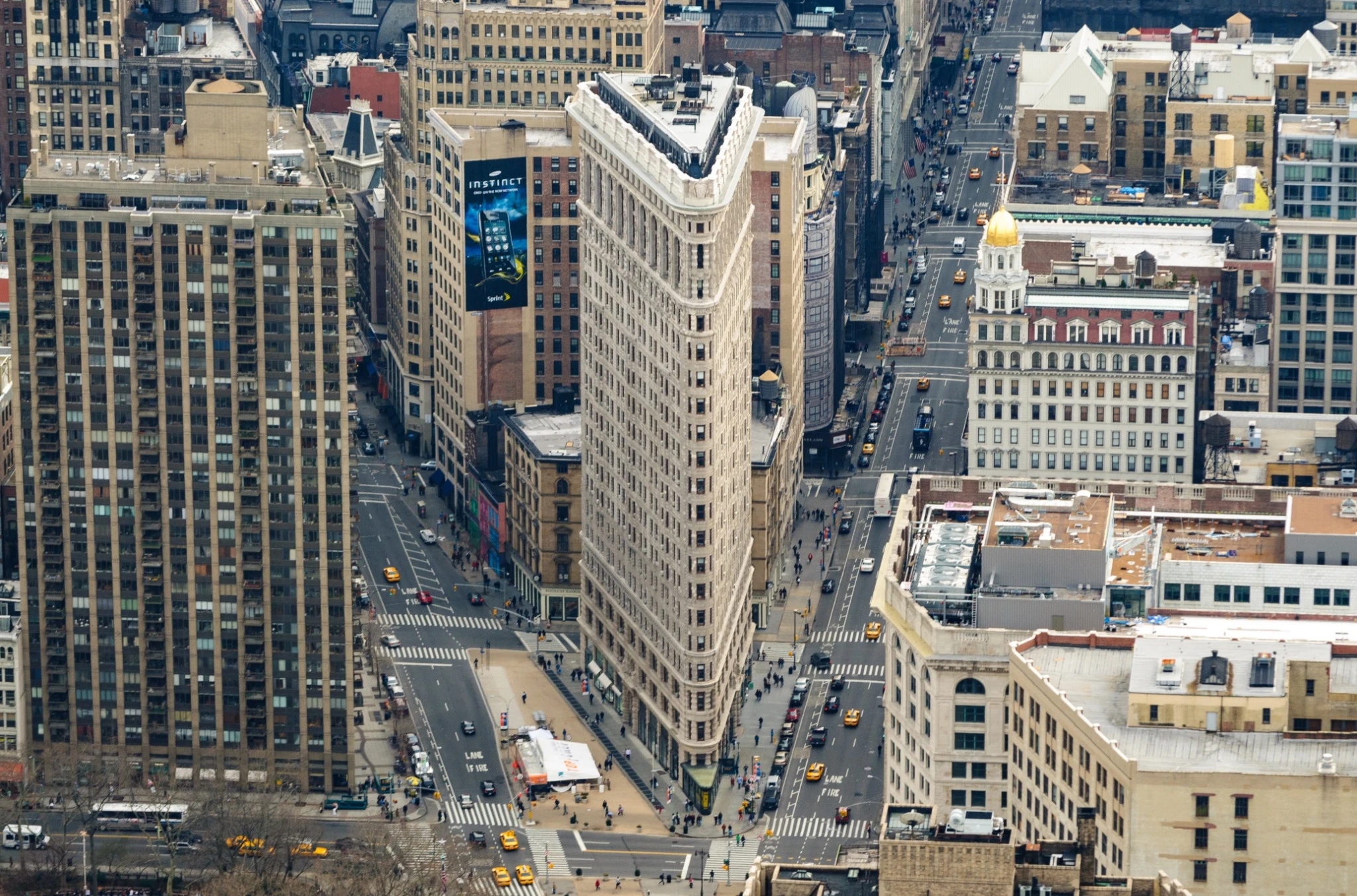Flatiron building standing tall in Midtown Manhattan.