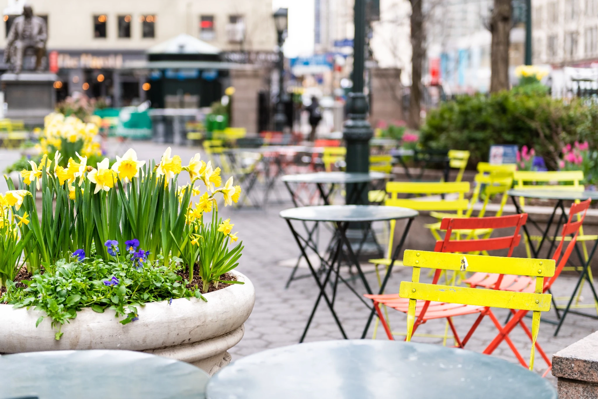 Empty tables and spring flowers near Koreatown in Midtown Manhattan.