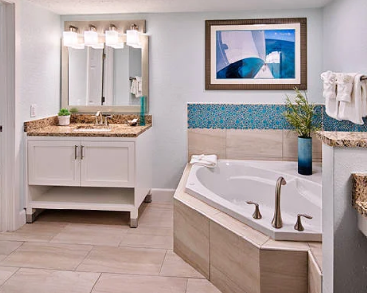 Grand Seas Resort - Daytona Beach, FL, beach resort w/ spacious accommodations, living area, kitchen, & oceanfront views.