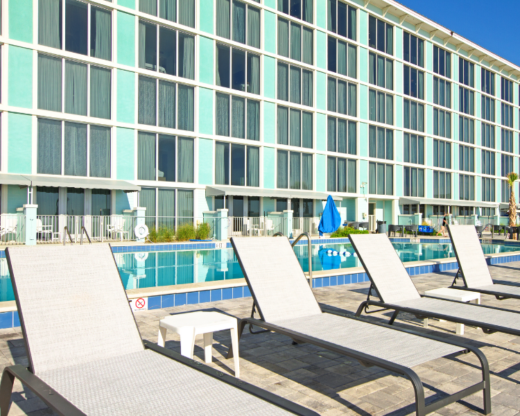 Grand Seas Resort - Daytona Beach, FL, beach resort w/ beach access, pools, poolside bar, & onsite dining.