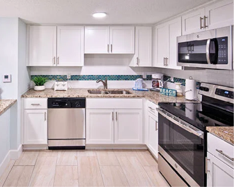 Grand Seas Resort - Daytona Beach, FL, beach resort w/ spacious accommodations, living area, kitchen, & oceanfront views.