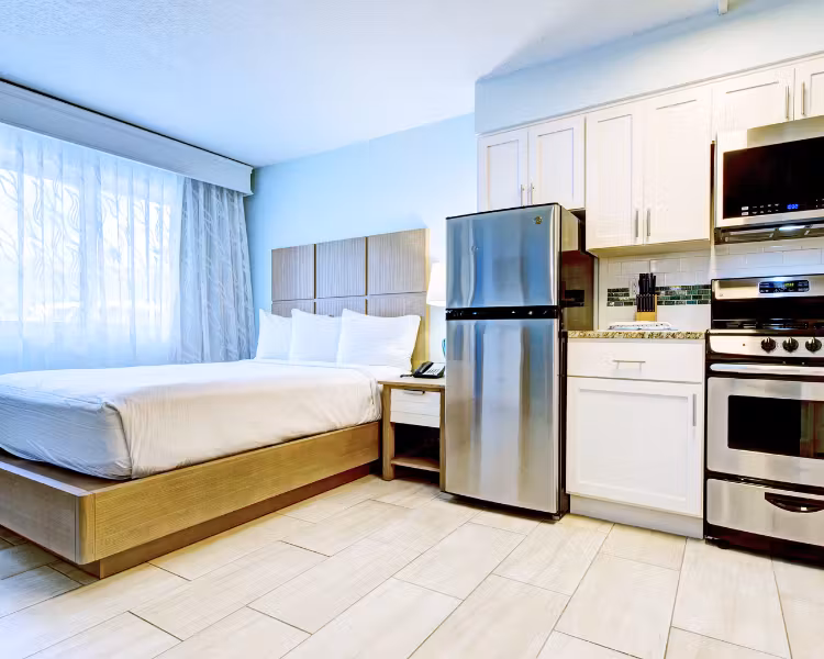 Grand Seas Resort - Daytona Beach, FL, beach resort w/ spacious accommodations, living area, kitchen, & oceanfront views.