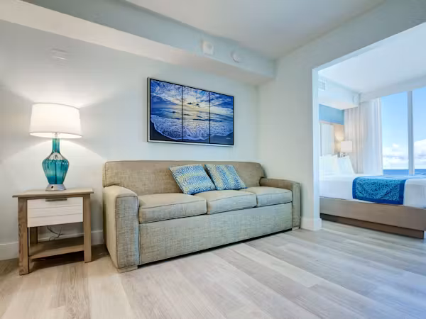 Grand Seas Resort - Daytona Beach, FL, beach resort w/ spacious accommodations, living area, kitchen, & oceanfront views.