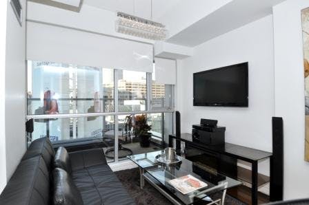 Yonge Suites The Loft, Split Level One Bedroom Suite Living Room
