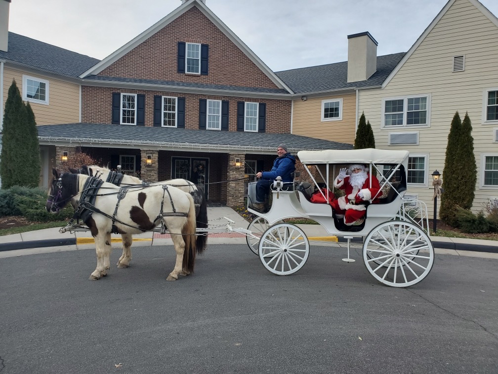 Lodge Entrance with Santa in Carriage