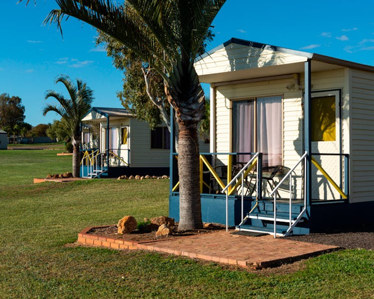 "Front view of ensuite cabins with verandas"