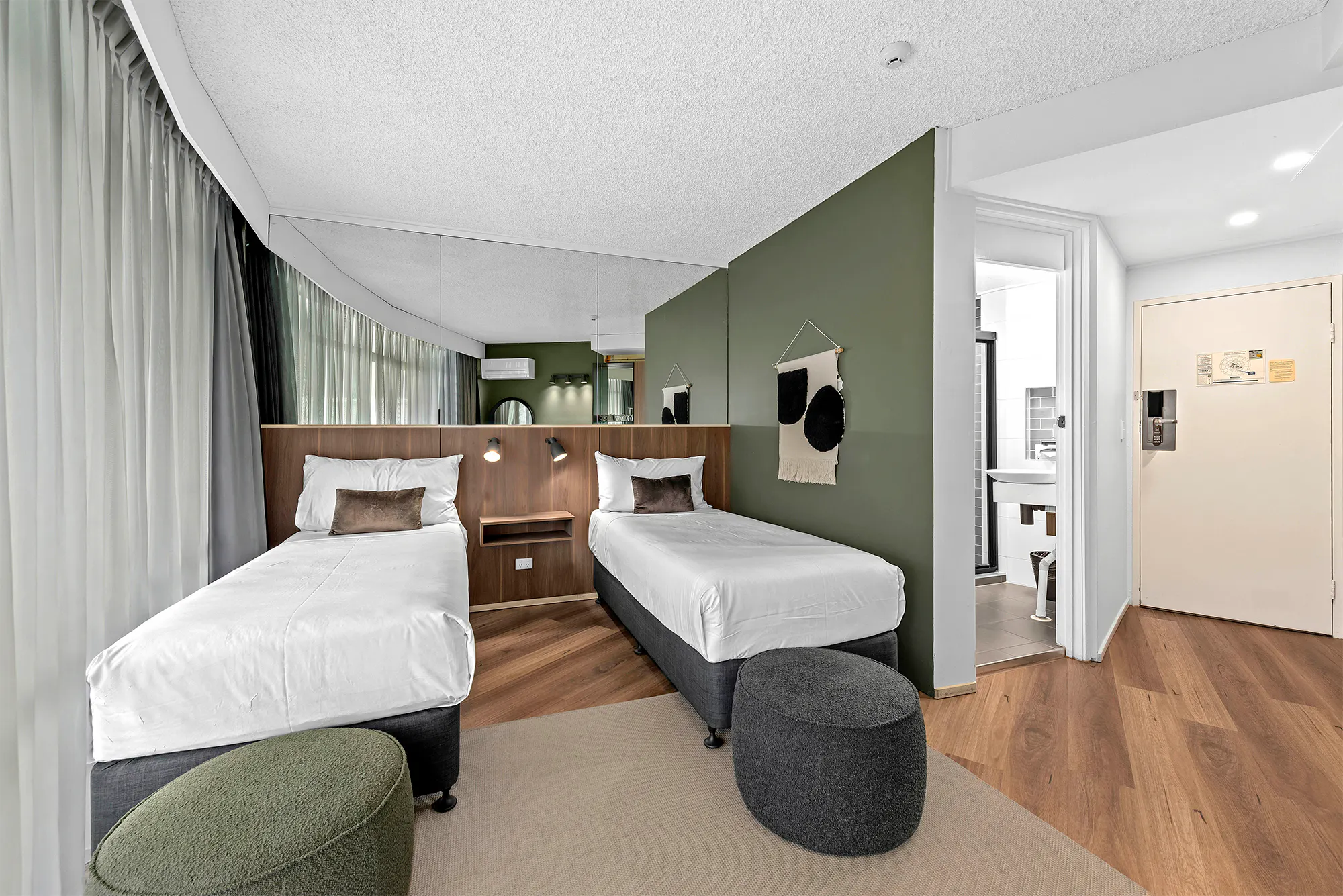 Twin beds and en-suite bathroom at Tower Mill Hotel Brisbane
