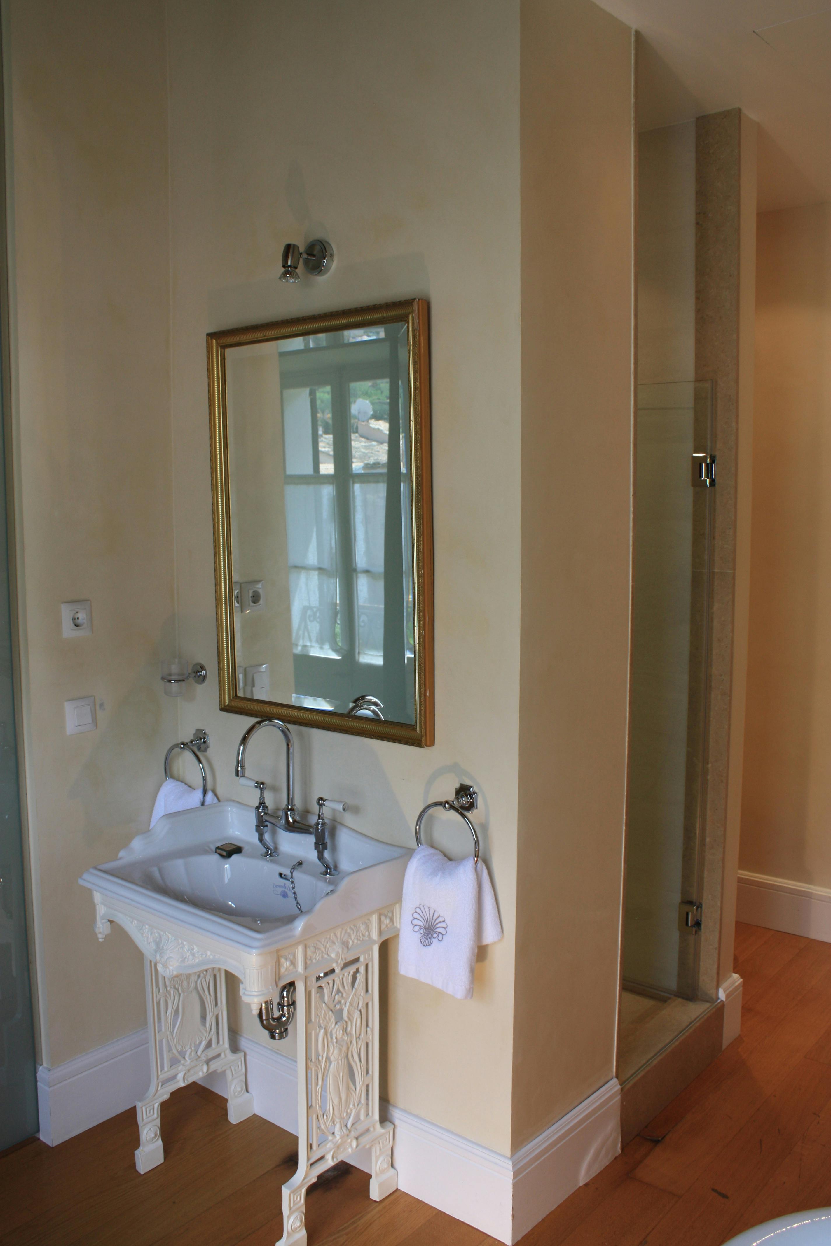 The antique sink within the Deia Suite bathroom