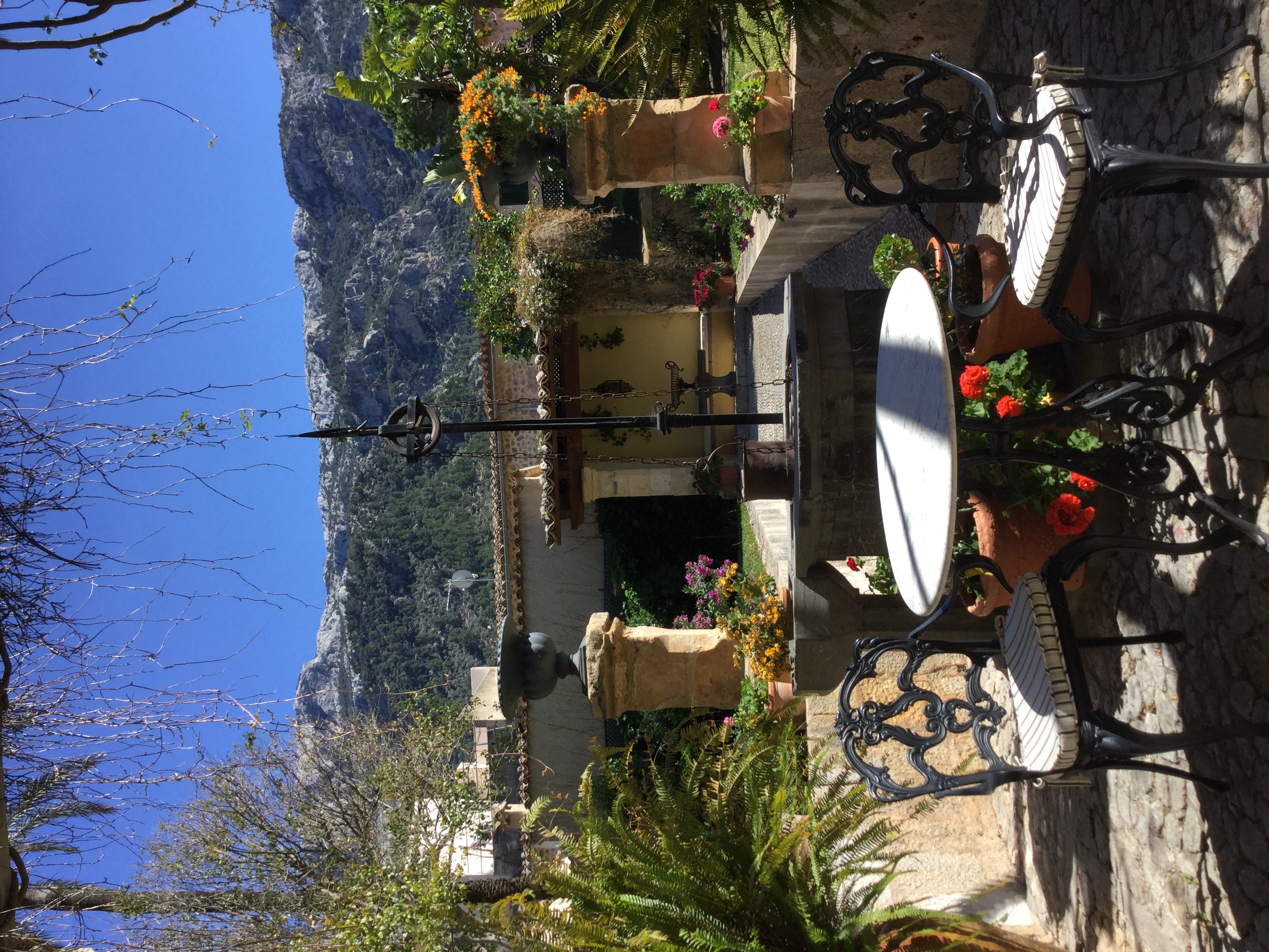 The Salvia well and font with the Tramuntana Mountains in the background