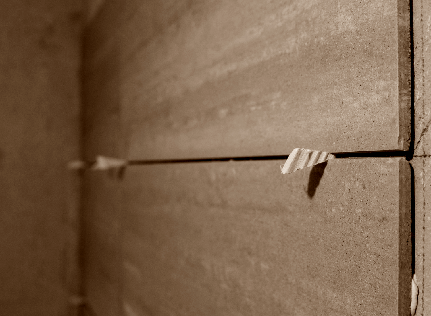 Kyoto BenTen Residences Restoration - Wood chips to keep tiles in place after fitting