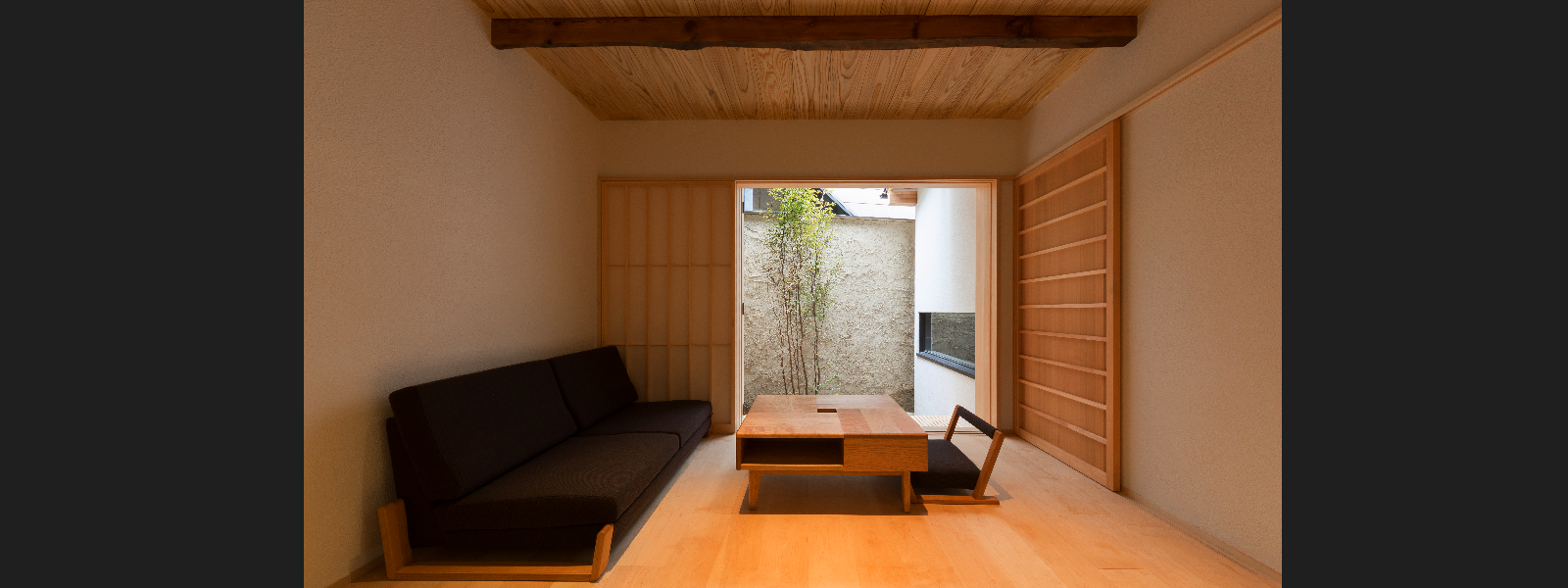 BenTen West Machiya in Kyoto - Living Area - featuring handmade furniture. Ideal for groups and families