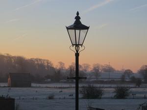Wintry view across the nearby pastures from Room 6.